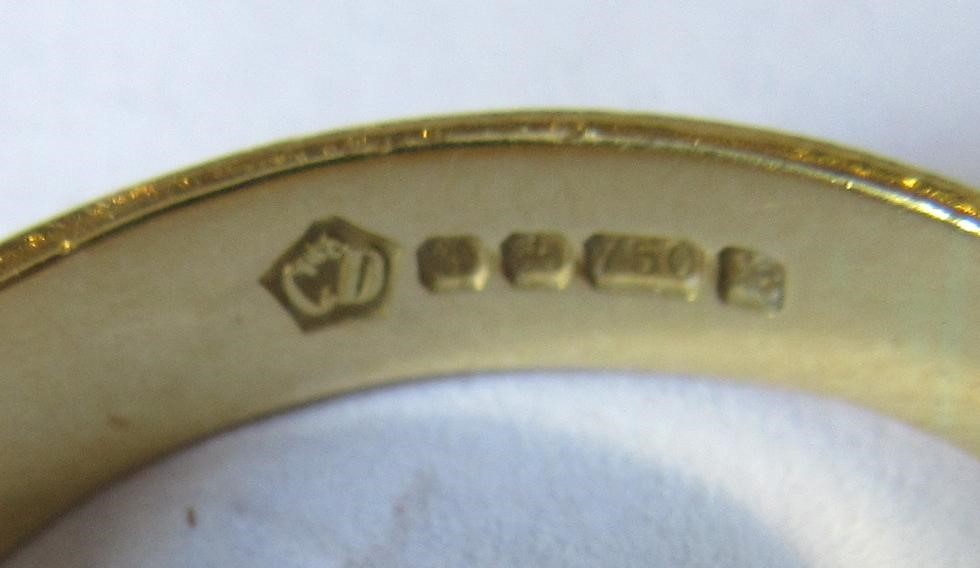 A GENTLEMAN'S DIAMOND HALF HOOP ETERNITY RING Image