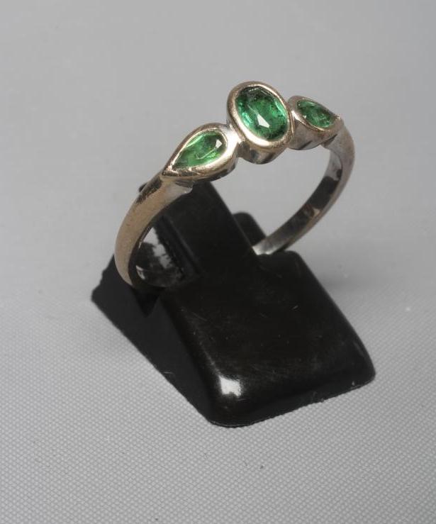 A THREE STONE TOURMALINE RING Image