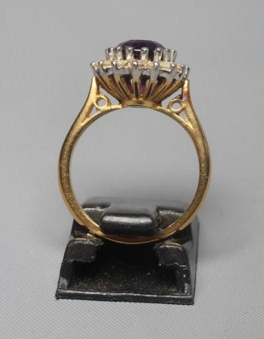 AN AMETHYST AND DIAMOND CLUSTER RING Image