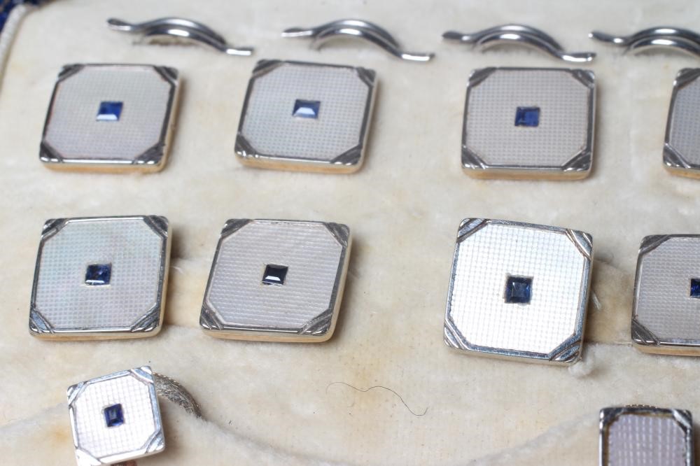 A GENTLEMAN'S DRESS SET with hatch carved mother-of-pearl square panels centred by small square cut Image