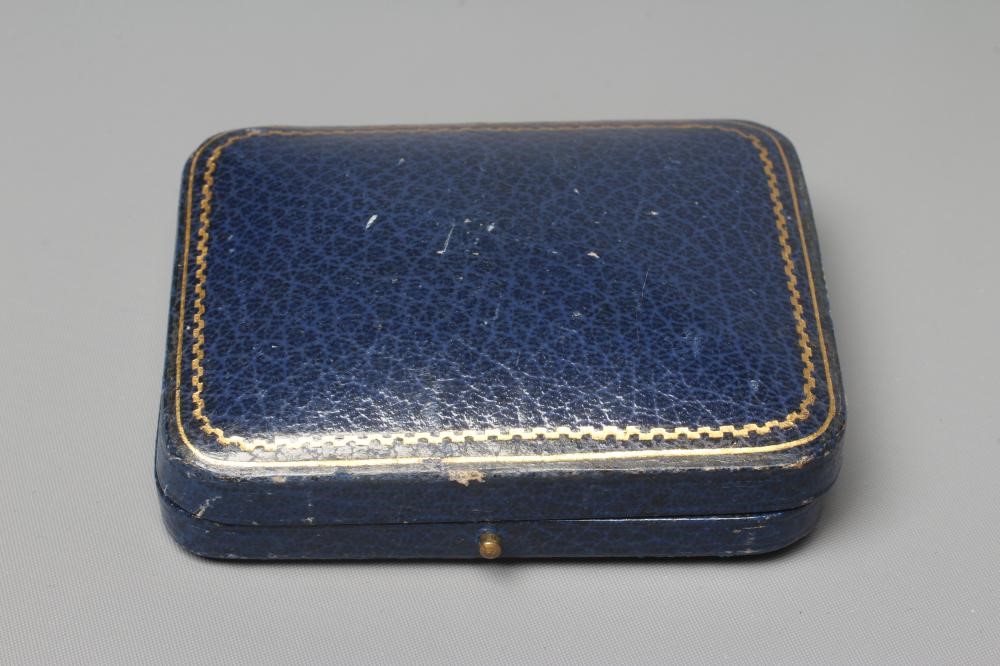 A GENTLEMAN'S DRESS SET with hatch carved mother-of-pearl square panels centred by small square cut Image