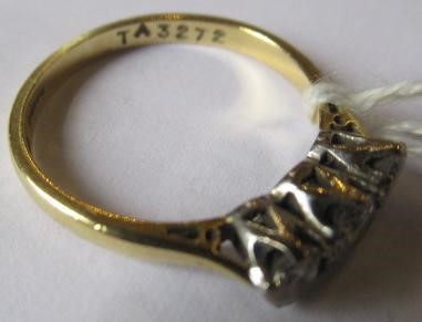 A THREE STONE DIAMOND RING, the brilliant cut stones each of approximately 0.25cts, claw set to a Image