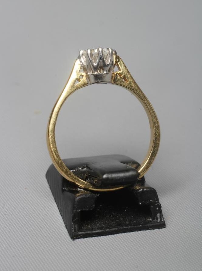 A DIAMOND SOLITAIRE RING, the brilliant cut stone of approximately 0.50cts claw set to a plain 18ct Image