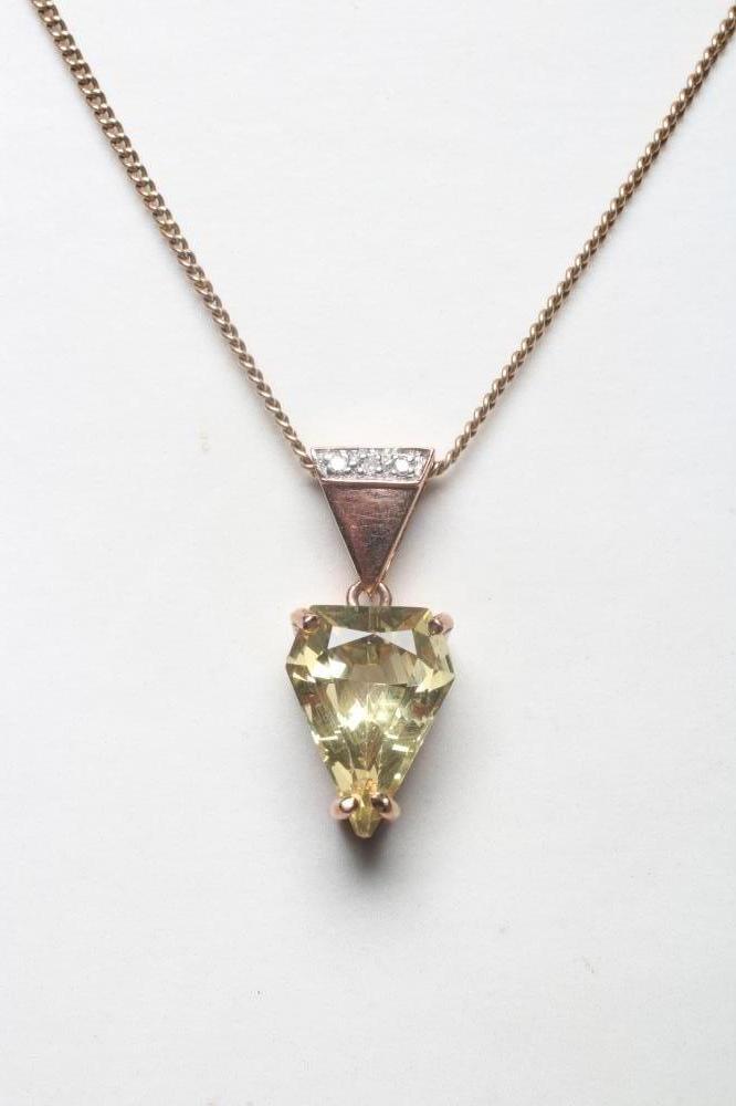 A CITRINE AND DIAMOND PENDANT Image
