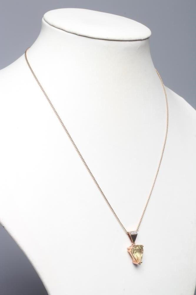 A CITRINE AND DIAMOND PENDANT Image