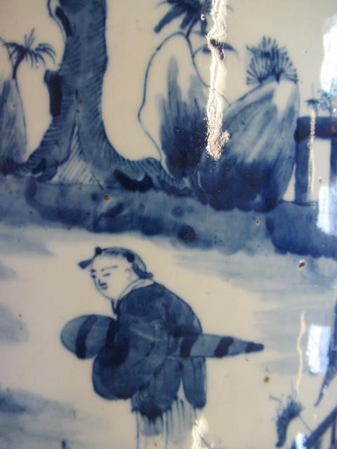 A CHINESE PORCELAIN CYLINDRICAL LARGE VASE painted in underglaze blue with a continuous scene of Image