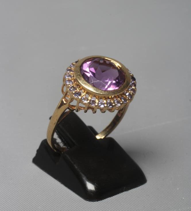 AN AMETHYST AND TANZANTITE CLUSTER DRESS RING Image