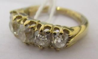 A FIVE STONE DIAMOND HALF HOOP RING, the old cut stones each of approximately 0.25cts, all claw set Image
