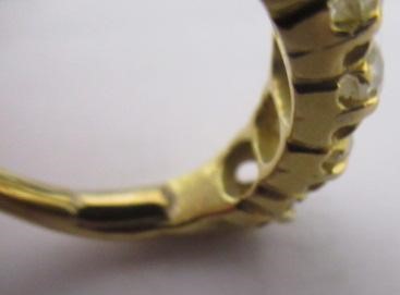 A FIVE STONE DIAMOND HALF HOOP RING, the old cut stones each of approximately 0.25cts, all claw set Image