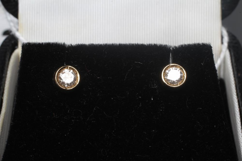 A PAIR OF DIAMOND SOLITAIRE EAR STUDS, the brilliant cut stones each of approximately 0.06cts, to Image