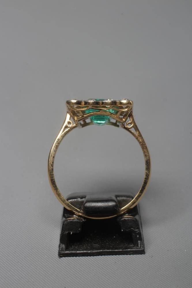 AN EMERALD AND DIAMOND PLAQUE RING Image