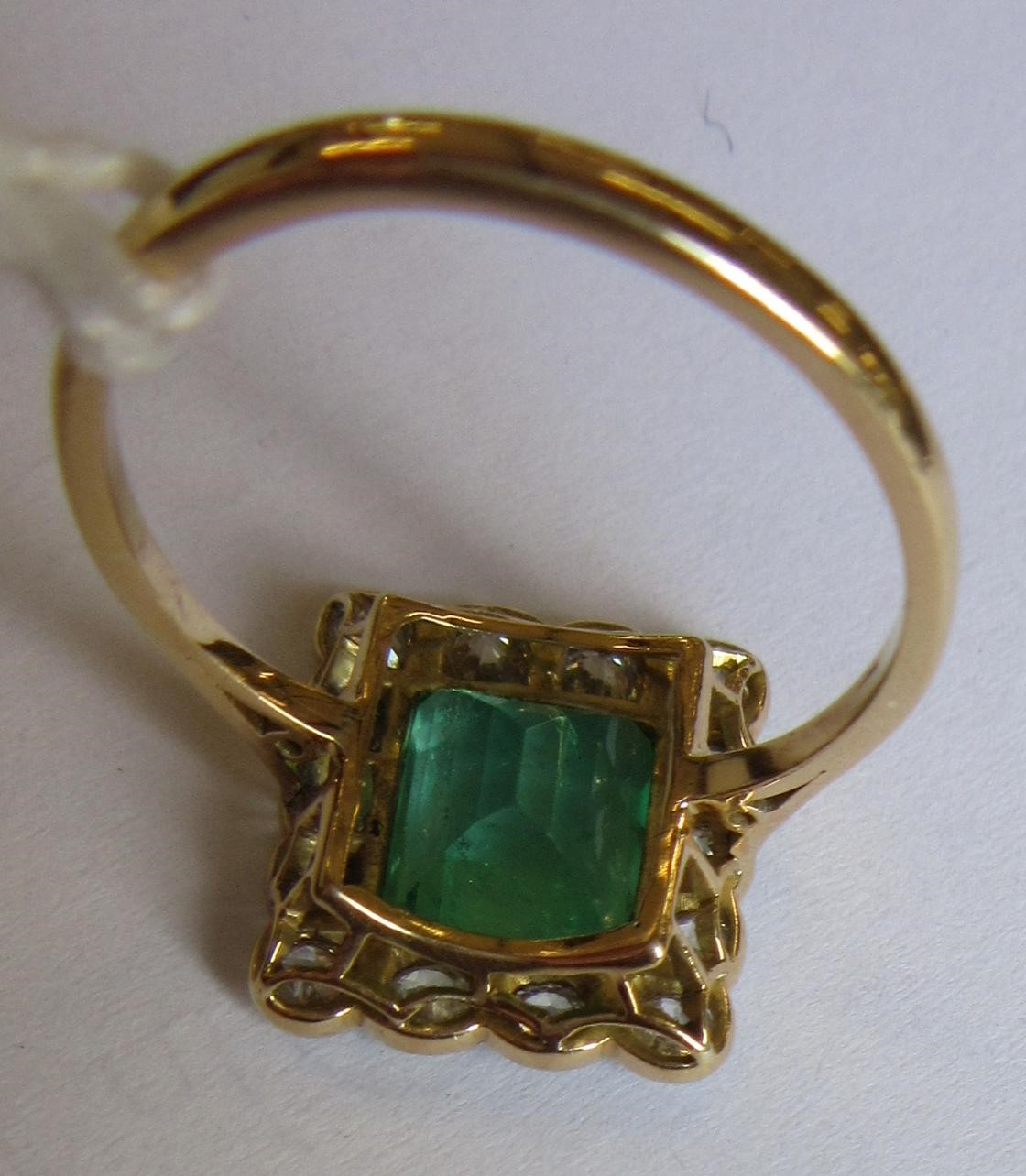 AN EMERALD AND DIAMOND PLAQUE RING Image