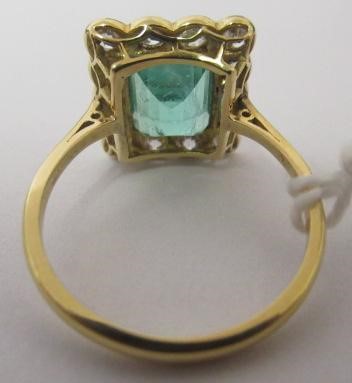 AN EMERALD AND DIAMOND PLAQUE RING Image