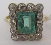 AN EMERALD AND DIAMOND PLAQUE RING Image