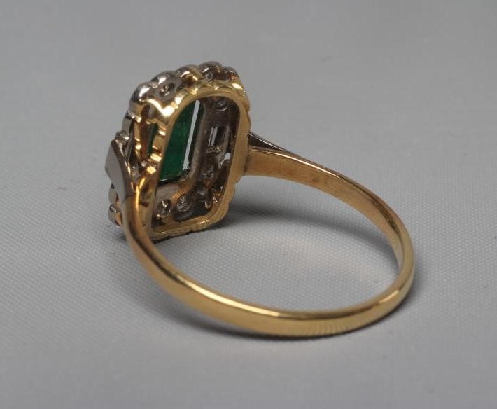 AN EMERALD AND DIAMOND DRESS RING Image