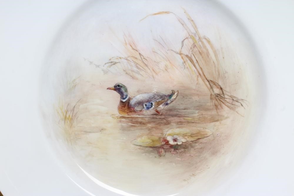 JAMES STINTON - TWO ROYAL WORCESTER PORCELAIN CABINET PLATES centrally painted with landscape Image