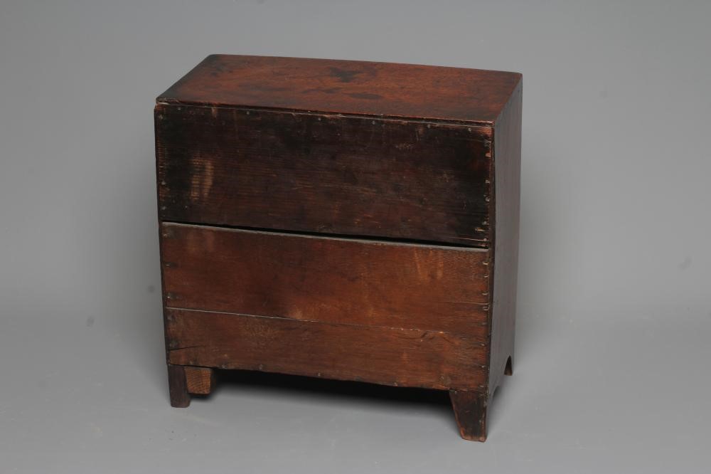 A MAHOGANY BOW FRONT CHEST OF DRAWERS Image