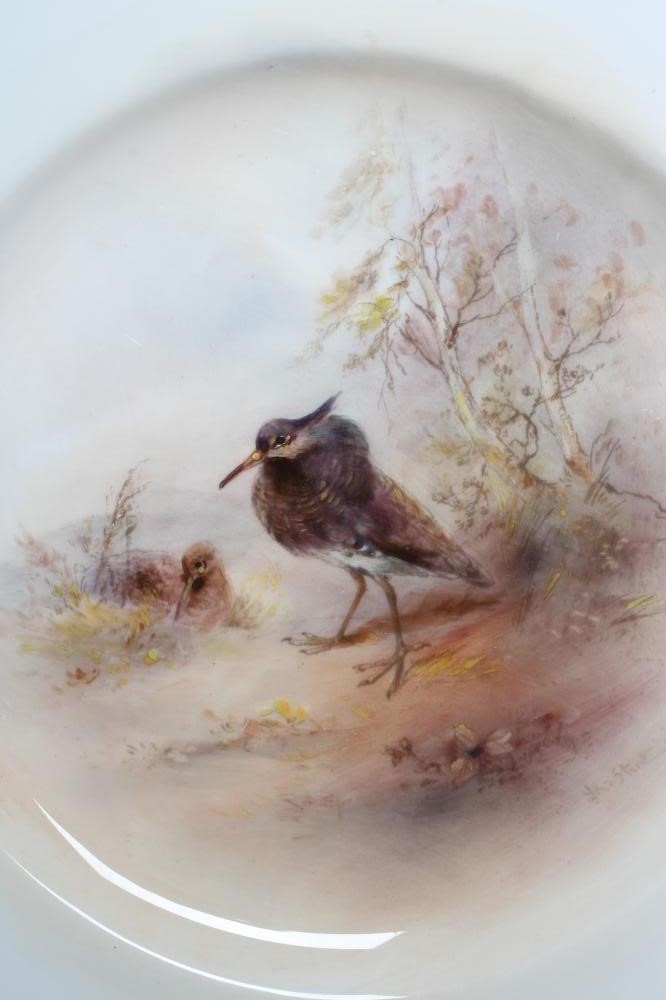 JAMES STINTON - TWO ROYAL WORCESTER PORCELAIN CABINET PLATES centrally painted with landscape Image