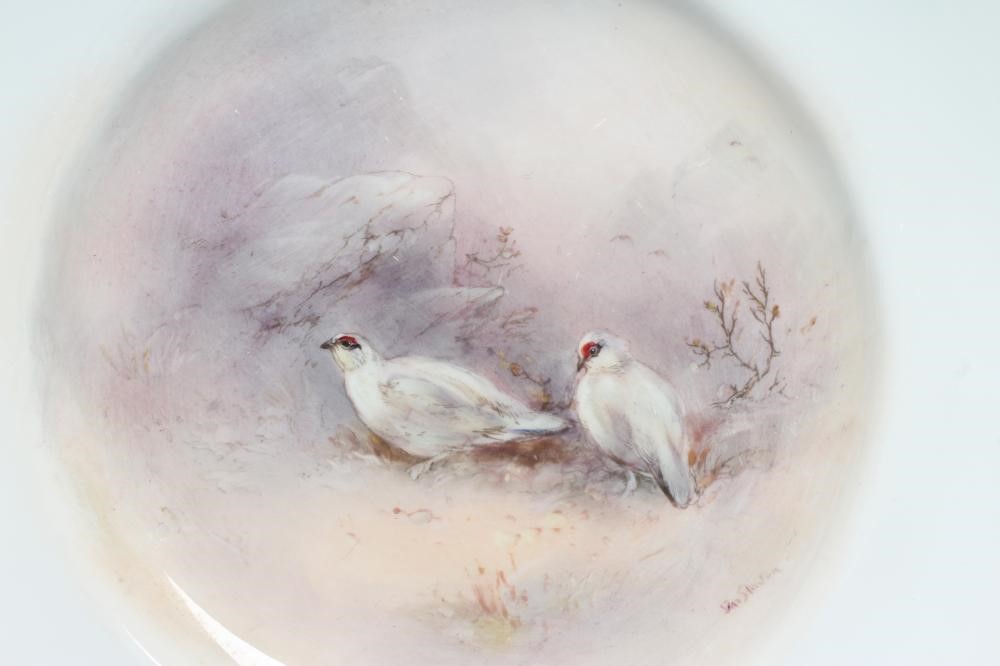 JAMES STINTON - TWO ROYAL WORCESTER PORCELAIN CABINET PLATES centrally painted with landscape Image