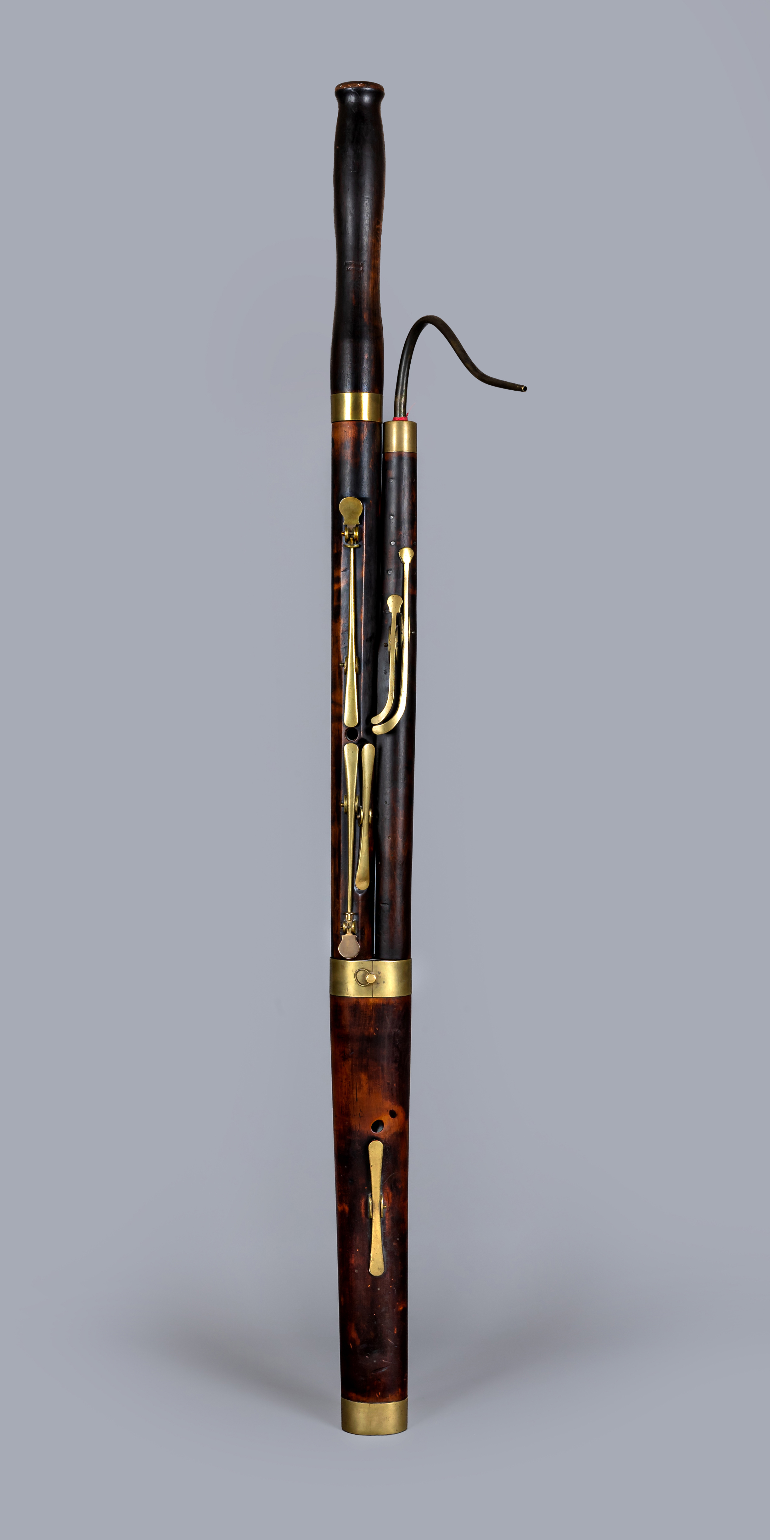 AN ENGLISH STAINED PEARWOOD BASSOON BY W MILHOUSE Image