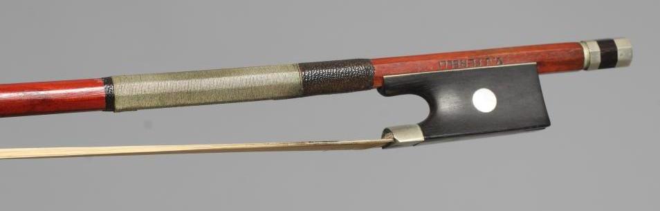 A VIOLIN BOW BY V J FERELLI with nickel mounted mother-of-pearl inlaid ebony frog Image