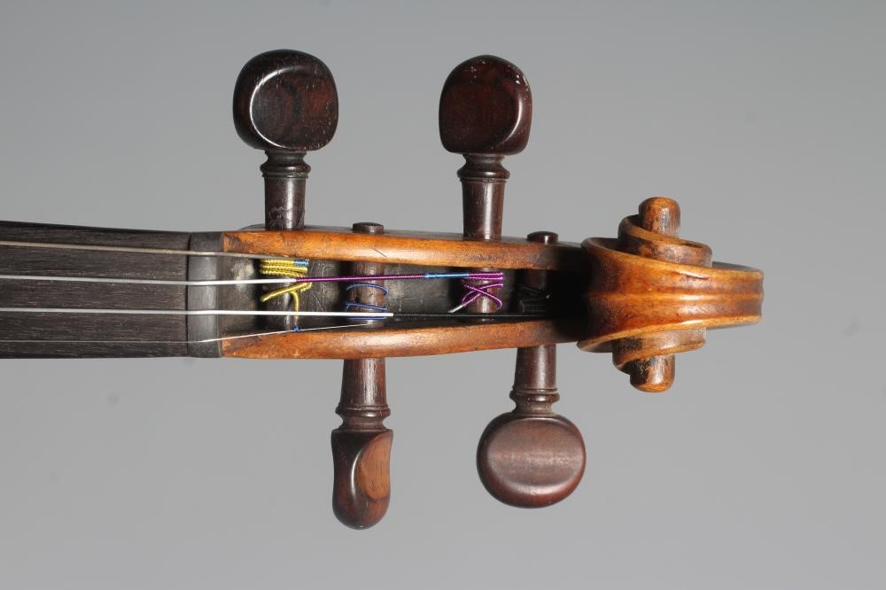 A VIOLIN with 14" two piece back Image