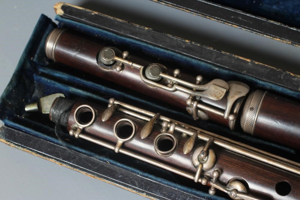 A THREE PIECE COCUSWOOD CONICAL FLUTE BY RUDALL & ROSE Image