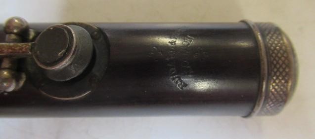 A THREE PIECE COCUSWOOD CONICAL FLUTE BY RUDALL & ROSE Image