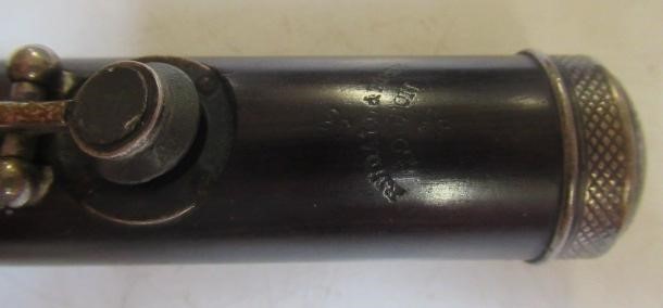 A THREE PIECE COCUSWOOD CONICAL FLUTE BY RUDALL & ROSE Image