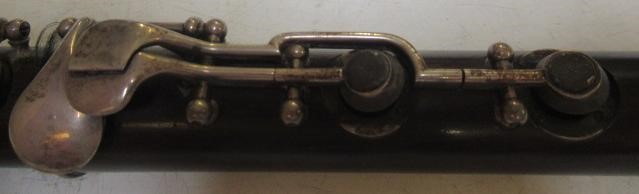 A THREE PIECE COCUSWOOD CONICAL FLUTE BY RUDALL & ROSE Image
