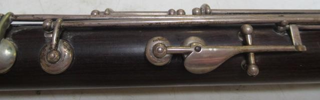 A THREE PIECE COCUSWOOD CONICAL FLUTE BY RUDALL & ROSE Image