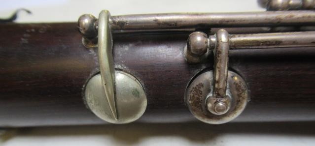 A THREE PIECE COCUSWOOD CONICAL FLUTE BY RUDALL & ROSE Image
