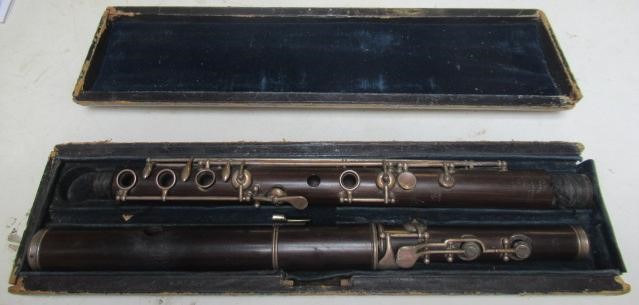 A THREE PIECE COCUSWOOD CONICAL FLUTE BY RUDALL & ROSE Image