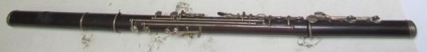 A THREE PIECE COCUSWOOD CONICAL FLUTE BY RUDALL & ROSE Image