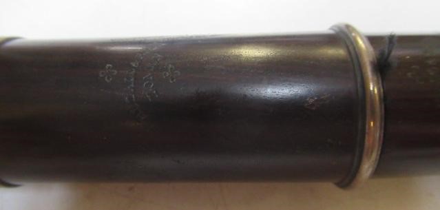 A THREE PIECE COCUSWOOD CONICAL FLUTE BY RUDALL & ROSE Image