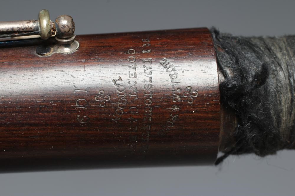 A THREE PIECE COCUSWOOD CONICAL FLUTE BY RUDALL & ROSE Image