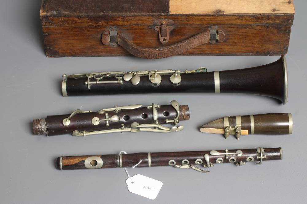 A ROSEWOOD FOUR PIECE CLARINET BY J R LAFLEUR, bell stamped with maker's name, 25 1/2" long, Image