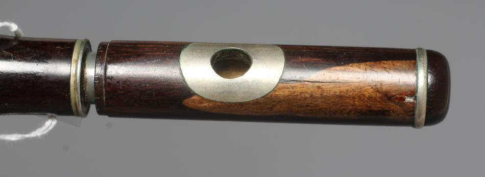 A ROSEWOOD FOUR PIECE CLARINET BY J R LAFLEUR, bell stamped with maker's name, 25 1/2" long, Image