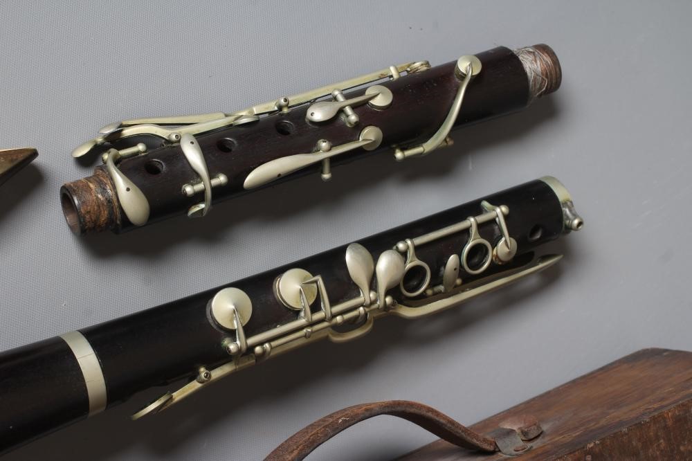 A ROSEWOOD FOUR PIECE CLARINET BY J R LAFLEUR, bell stamped with maker's name, 25 1/2" long, Image