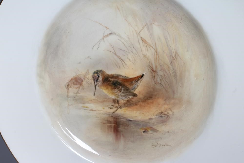 JAMES STINTON - THREE ROYAL WORCESTER PORCELAIN CABINET PLATES centrally painted with 'Woodcock' Image