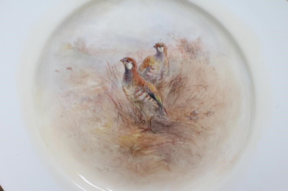 JAMES STINTON - THREE ROYAL WORCESTER PORCELAIN CABINET PLATES centrally painted with 'Woodcock' Image