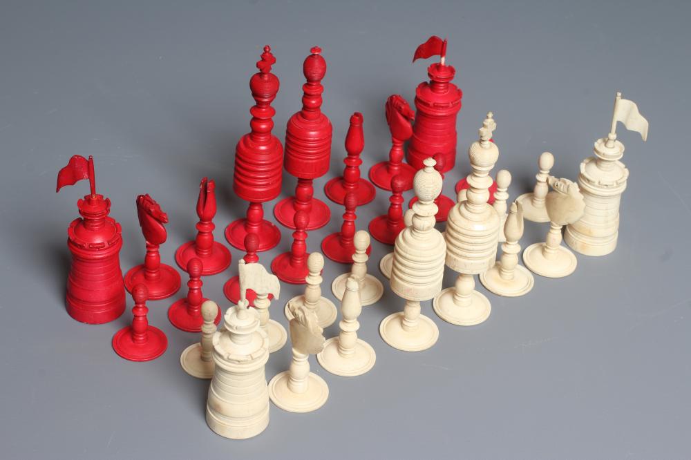 AN ANGLO INDIAN TURNED BONE LARGE CHESS SET, mid 19th century, natural and stained red, Kings 6" Image