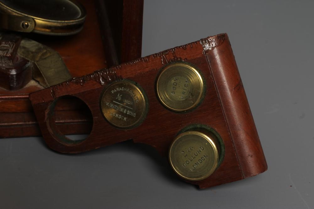 A LATE VICTORIAN BINOCULAR MICROSCOPE BY DOLLAND, LONDON with assorted optics, lenses and Image