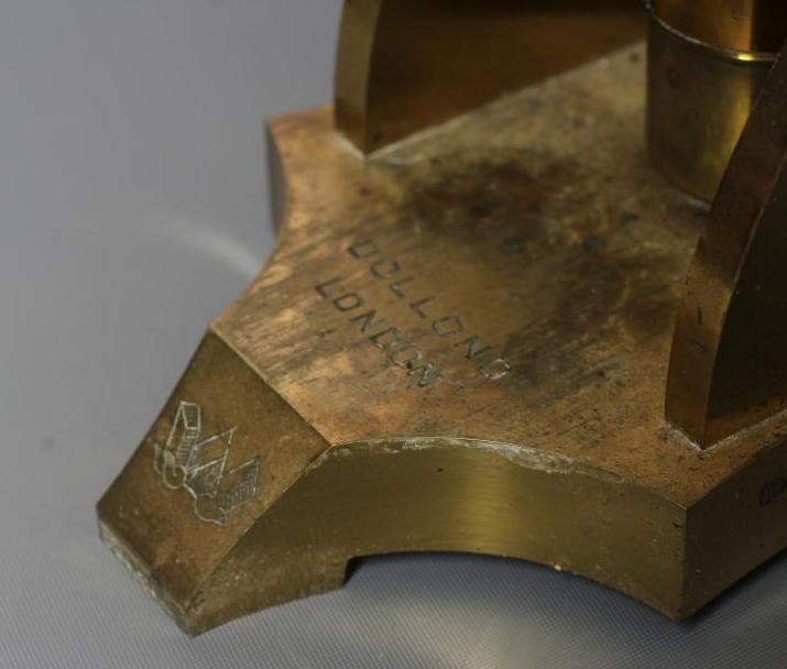 A LATE VICTORIAN BINOCULAR MICROSCOPE BY DOLLAND, LONDON with assorted optics, lenses and Image