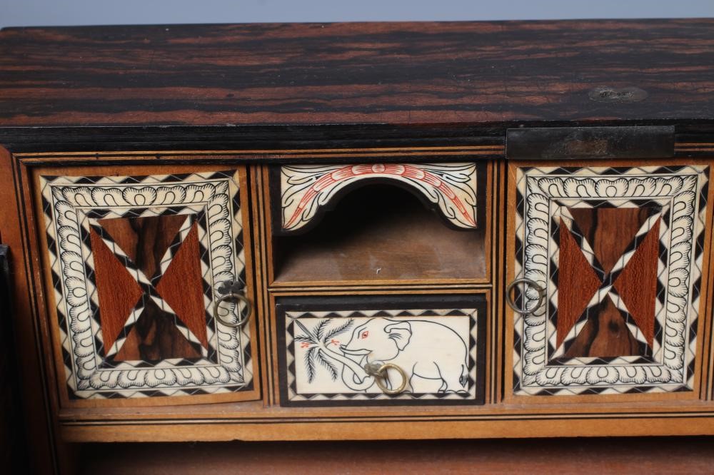 A VICTORIAN COROMANDEL WRITING BOX of oblong form Image