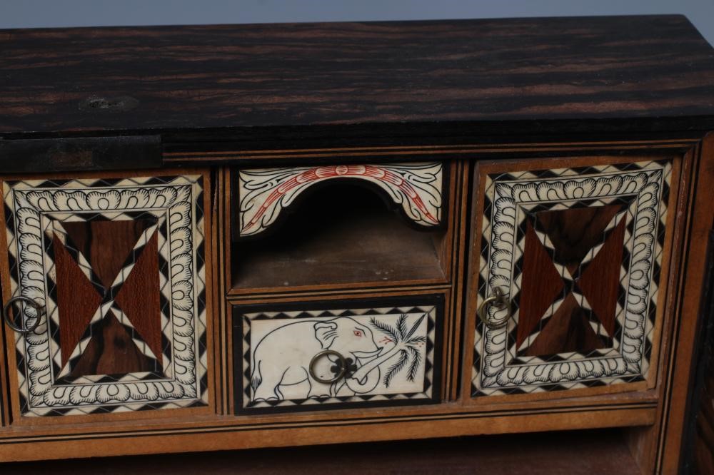 A VICTORIAN COROMANDEL WRITING BOX of oblong form Image
