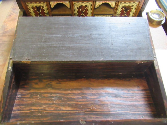 A VICTORIAN COROMANDEL WRITING BOX of oblong form Image