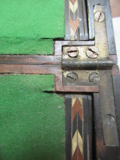 A VICTORIAN COROMANDEL WRITING BOX of oblong form Image