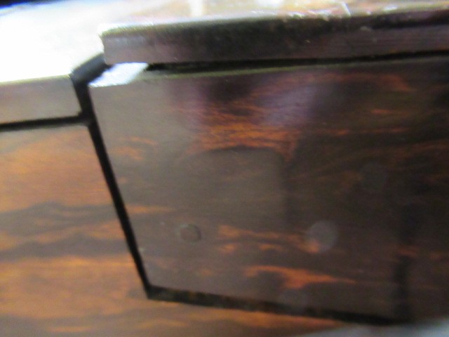 A VICTORIAN COROMANDEL WRITING BOX of oblong form Image
