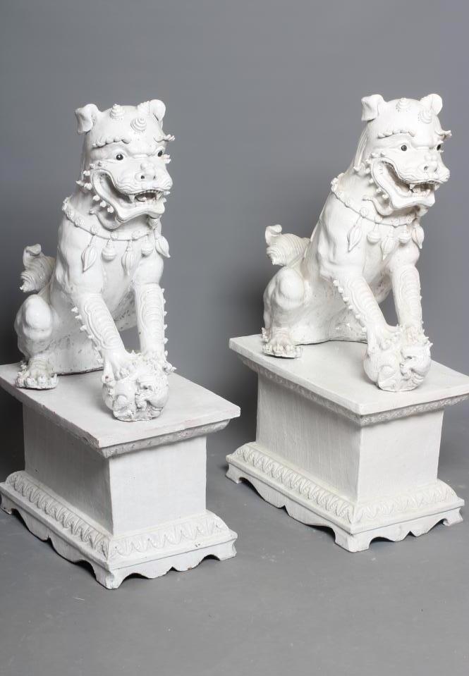 A LARGE PAIR OF WHITE CRACKLE GLAZED TERRACOTTA TEMPLE LIONS Image